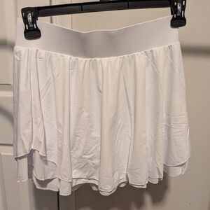 White buttery soft tennis skirt with built in shorts